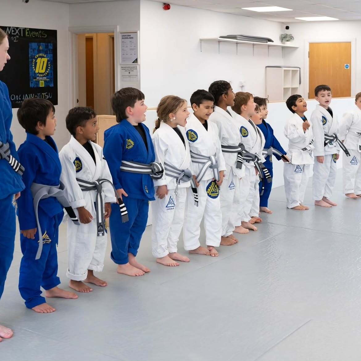 Kids lined up in gi at Gracie Swindon